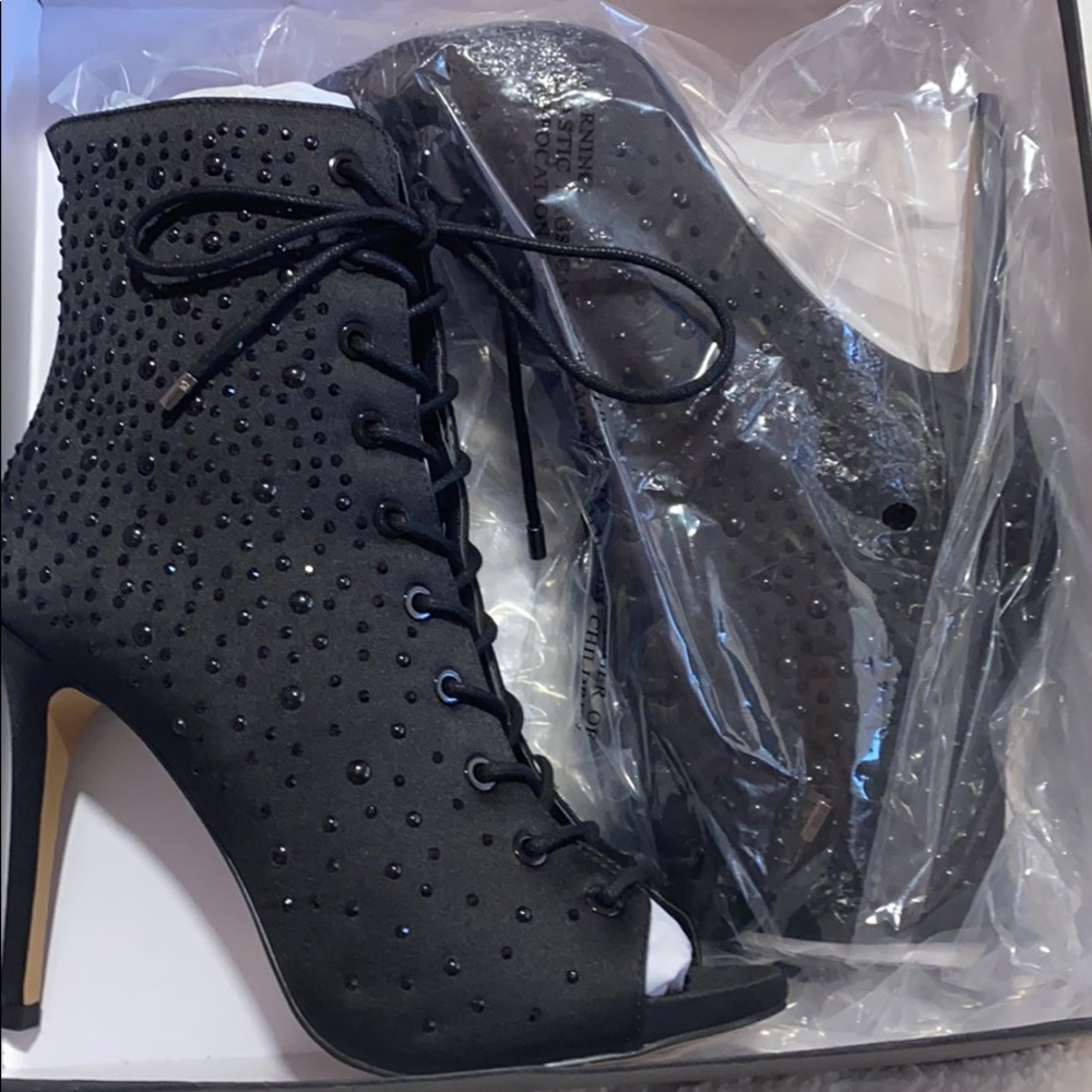 Brand new Bebe Black booties